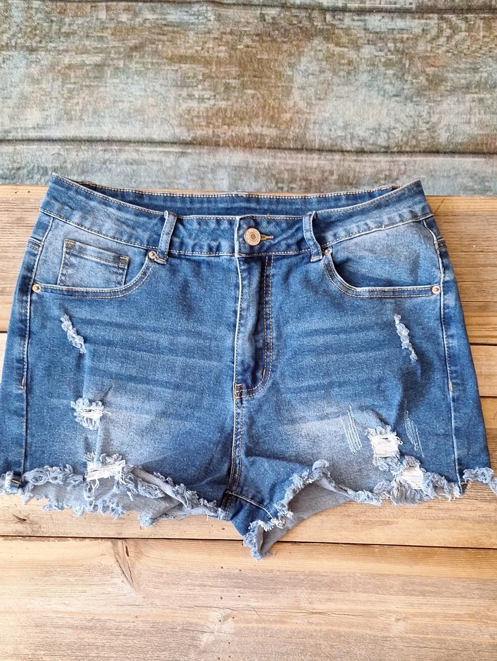 Women’s Dark Blue Distressed Denim Shorts. Large